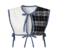 Two-piece outfit with a white top and plaid skirt on a gray background